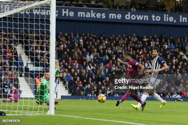 Raheem Sterling of Manchester City scores his sides third goal during the Premier League match between West Bromwich Albion and Manchester City at...