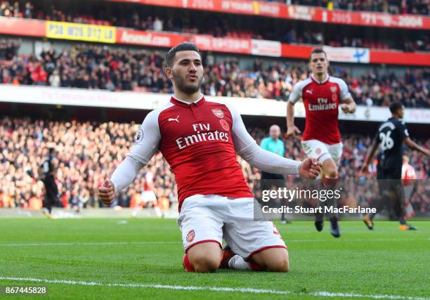 Sead Kolasinac celebrates scoring the 1st Arsenal goal during the Premier League match between Arsenal and Swansea City at Emirates Stadium on...