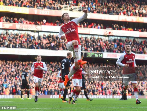 Aaron Ramsey celebrates scoring the 2nd Arsenal goal during the Premier League match between Arsenal and Swansea City at Emirates Stadium on October...