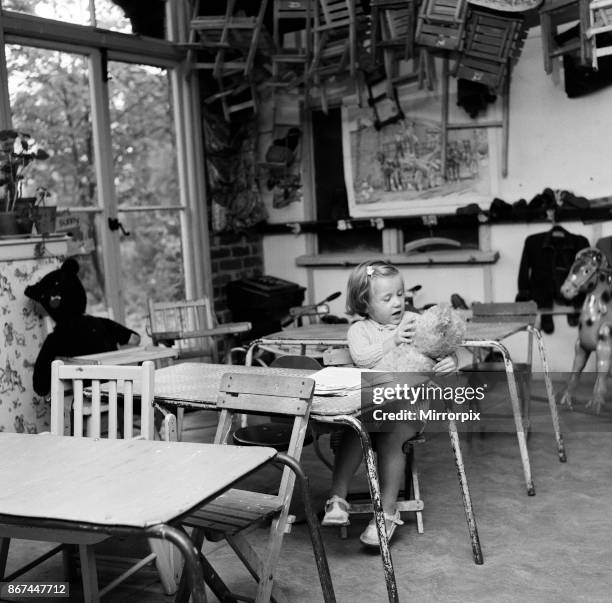 Margaret, aged 2 and a half, starts nursery school. She is the only one of 30 pupils at the school to turn up today, all the others have Asian flu,...