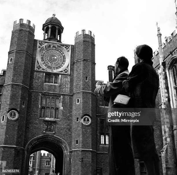 Astronomical clock at Hampton Court Palace, London. October 1952.