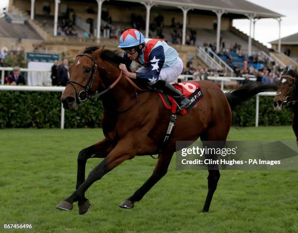 Sir Dancealot ridden by Ryan Moore wins the Join Racing Post Members Club Conditions Stakes during Racing Post Trophy day at Doncaster Racecourse.