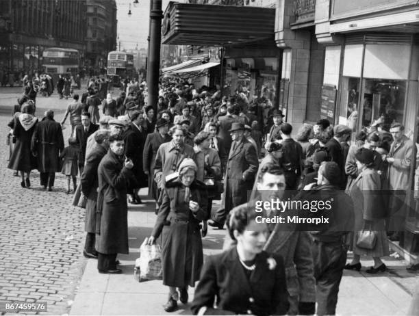 Shopper out and about on Market Street, Manchester 15th April 1950.