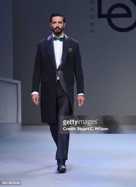 Model walks the runway during the Behnoode Menswear show at Fashion Forward October 2017 held at the Dubai Design District on October 28, 2017 in...