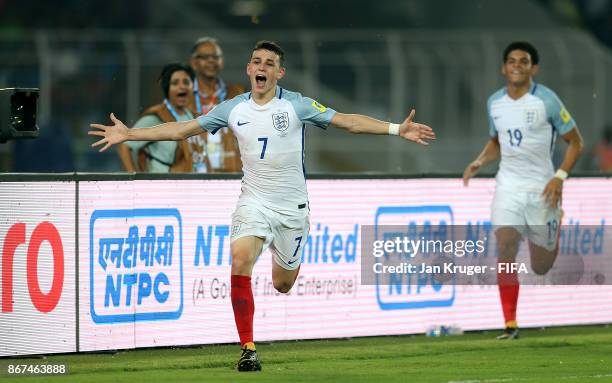 Philip Foden of England celebrates scoring the 3rd goal during the FIFA U-17 World Cup India 2017 Final match between England and Spain at...