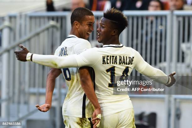 Monaco's forward Keita Balde celebrates after scoring a goal during the French L1 football match between Bordeaux and Monaco on October 28, 2017 at...