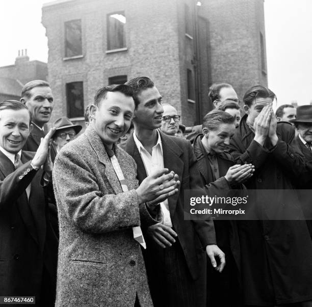 Crowds watching Phil Strong who is selling health cures in a bottle. You can see him in any street market - the man with the wonder cure, dispensing...