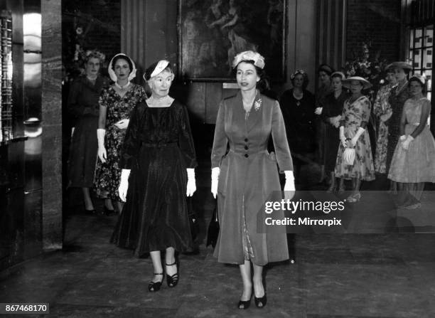 Queen Elizabeth II visits Shakespeare Memorial theatre, she is pictured with Lady Iliffe, 14th June 1957.