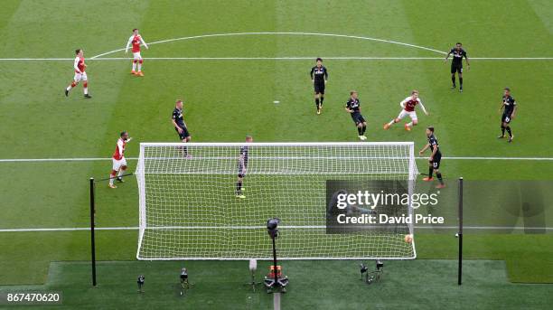 Aaron Ramsey scores Arsenal's 2nd goal during the Premier League match between Arsenal and Swansea City at Emirates Stadium on October 28, 2017 in...