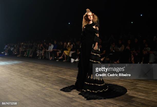 Model walks the runway during the Zareena show at Fashion Forward October 2017 held at the Dubai Design District on October 28, 2017 in Dubai, United...