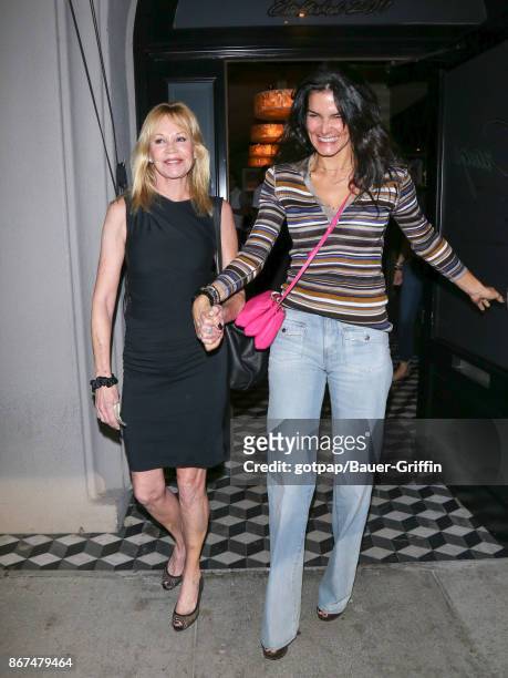 Melanie Griffith and Angie Harmon are seen on October 27, 2017 in Los Angeles, California.