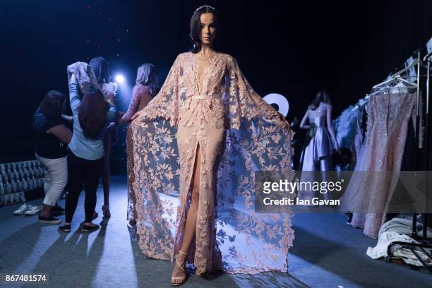 Model backstage ahead of the Joao Rolo International show during Fashion Forward October 2017 held at the Dubai Design District on October 28, 2017...