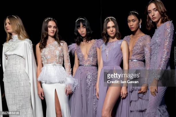 Models backstage ahead of the Joao Rolo International show during Fashion Forward October 2017 held at the Dubai Design District on October 28, 2017...