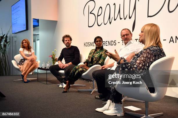 Host Mareile Hoeppner , photographer Oliver Beckmann, dancer Motsi Mabuse, make-up artist Horst Kirchberger and host Patricia Riekel attend the Bunte...