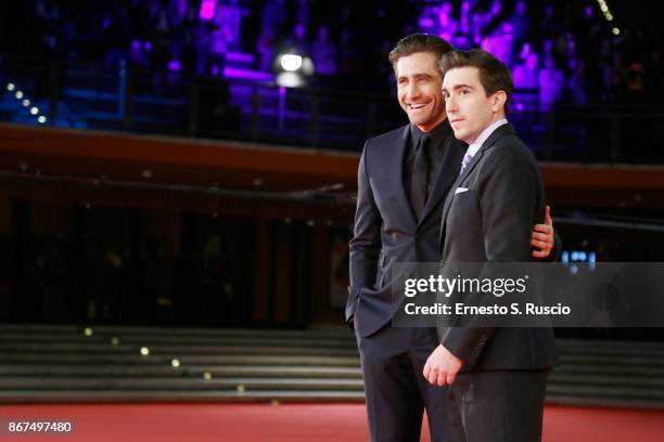 Jake Gyllenhaal and Jeff Bauman walk a red carpet for 'Stronger' during the 12th Rome Film Fest at Auditorium Parco Della Musica on October 28, 2017...