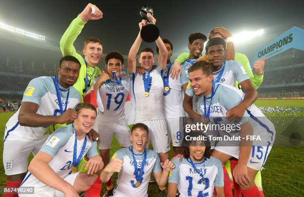 England players celebrate with the trophy after winning the FIFA U-17 World Cup India 2017 Final match between England and Spain at Vivekananda Yuba...