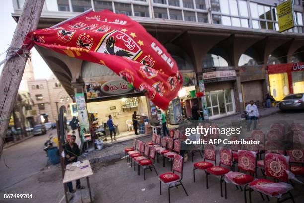 Coffee shops prepare screens and seating ahead of the CAF Champions League final football match between Al-Ahly vs Wydad Casablanca, in Cairo's 6th...