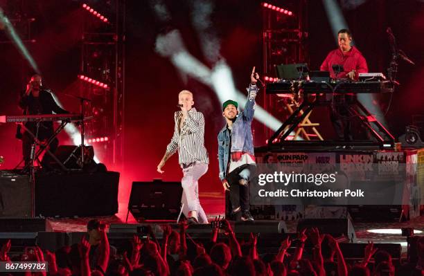 Musicians from Linkin Park; Mike Shinoda and Joe Hahn perform with MAchine Gun Kelly during the "Linkin Park And Friends Celebrate Life In Honor Of...