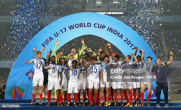 England players celebrate with the trophy after victory during the FIFA U-17 World Cup India 2017 Final match between England and Spain at...