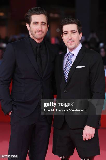 Jake Gyllenhaal and Jeff Bauman walk a red carpet for 'Stronger' during the 12th Rome Film Fest at Auditorium Parco Della Musica on October 28, 2017...