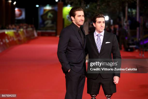 Jake Gyllenhaal and Jeff Bauman walk a red carpet for 'Stronger' during the 12th Rome Film Fest at Auditorium Parco Della Musica on October 28, 2017...