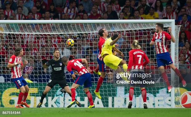 Carlos Bacca of Villarreal CF scores his team's opening goal during the La Liga match between Atletico Madrid and Villarreal at Estadio Wanda...