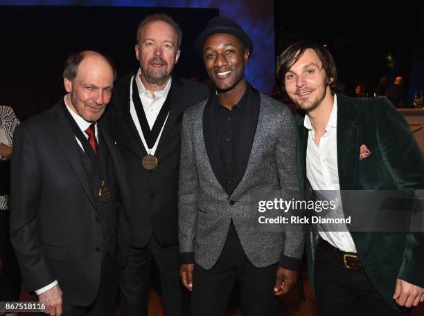 Members Bobby Bradock and Don Schlitz with Singer/Songwriters Aloe Blacc and Charlie Worsham attend the Country Music Hall Of Fame And Museum...