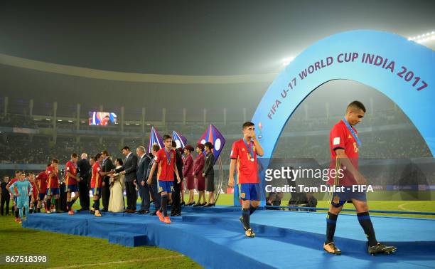 Spain players collect their silver medals after the FIFA U-17 World Cup India 2017 Final match between England and Spain at Vivekananda Yuba Bharati...