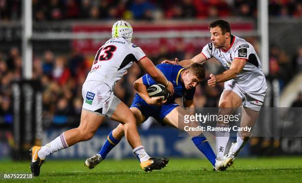 Belfast , United Kingdom - 28 October 2017; Jordan Larmour of Leinster in action against Luke Marshall, left, and Tommy Bowe of Ulster during the...