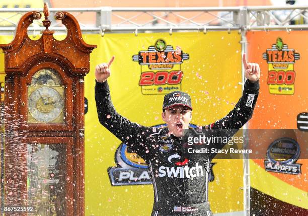 Noah Gragson, driver of the Switch Toyota, celebrates in Victory Lane after winning the NASCAR Camping World Truck Series Texas Roadhouse 200 at...