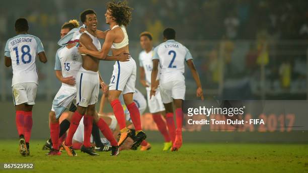 Tashan Oakley-Boothe and Nya Kirby of England celebrate winning the FIFA U-17 World Cup India 2017 Final match between England and Spain at...