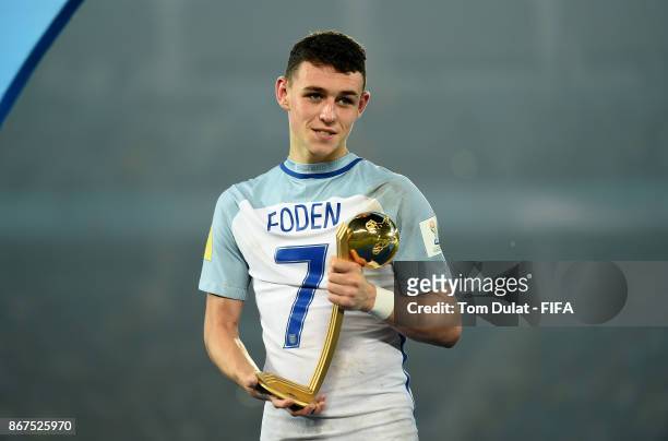 Philip Foden poses with Man of the Tournament trophy after the FIFA U-17 World Cup India 2017 Final match between England and Spain at Vivekananda...