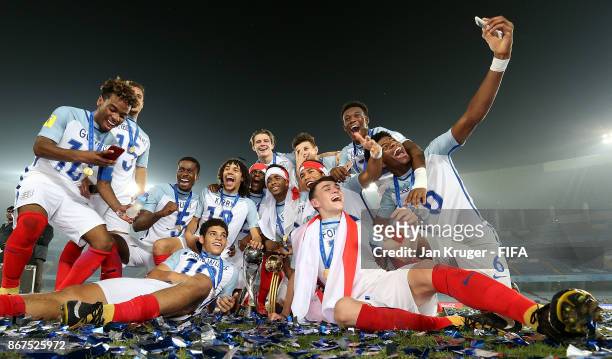 England players celebrate with the trophy during the FIFA U-17 World Cup India 2017 Final match between England and Spain at Vivekananda Yuba Bharati...