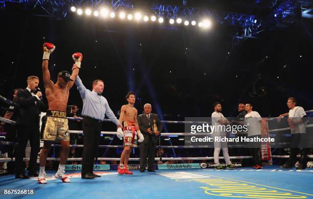 Kal Yafai celebrates as he is awarded victory after his WBA Super-Flyweight Championship contest against Sho Ishida at Principality Stadium on...