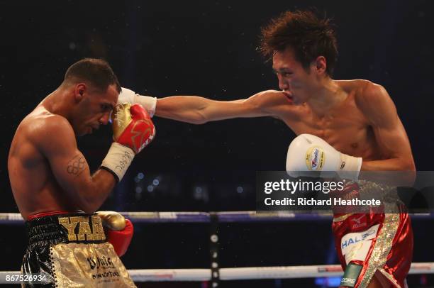 Kal Yafai and Sho Ishida in action during their WBA Super-Flyweight Championship contest at Principality Stadium on October 28, 2017 in Cardiff,...