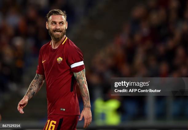 Roma's midfielder Daniele De Rossi reacts during the Italian Serie A football match Roma vs Bologna on October 28, 2017 at the Olympic Stadium in...