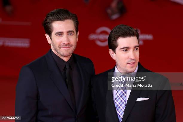 Jake Gyllenhaal and Jeff Bauman walk a red carpet for 'Stronger' during the 12th Rome Film Fest at Auditorium Parco Della Musica on October 28, 2017...
