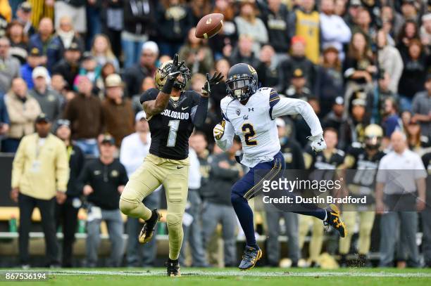 Wide receiver Shay Fields of the Colorado Buffaloes has a catch for a long second quarter touchdown under coverage by cornerback Darius Allensworth...