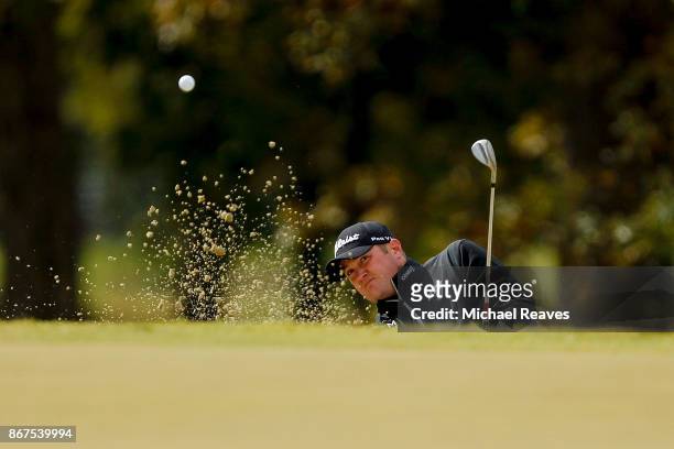 Jason Kokrak plays a shot from a bunker on the third hole during the third round of the Sanderson Farms Championship at the Country Club of Jackson...