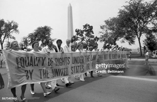 Thousands of exuberant backers of the Equal Rights Amendment, marched on Congress to plea for extension of the ratification deadline.