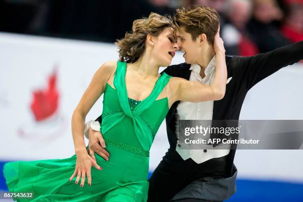 Carolane Soucisse and Shane Firus of Canada perform their free dance in the dance competition at the 2017 Skate Canada International ISU Grand Prix...