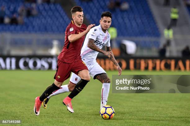 Stephan El Shaarawy of Roma is challenged by Erick Pulgar of Bologna during the Serie A match between Roma and Bologna at Olympic Stadium, Roma,...