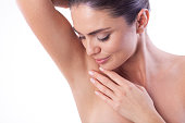 Close up of woman showing her armpit.