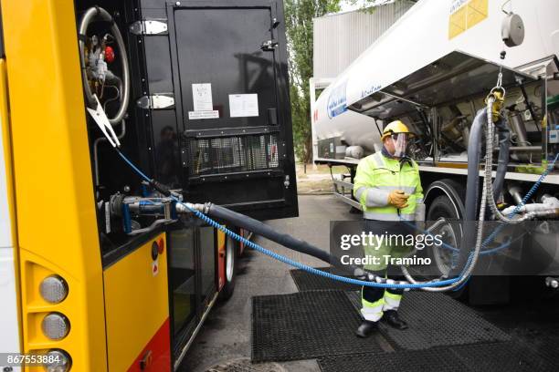 liquid methane refueling on the mobile filling station - warsaw bus stock pictures, royalty-free photos & images
