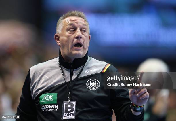 Head coach Michael Biegler of Germany gestures during the women's international friendly match between Germany and The Netherlands at Getec Arena on...