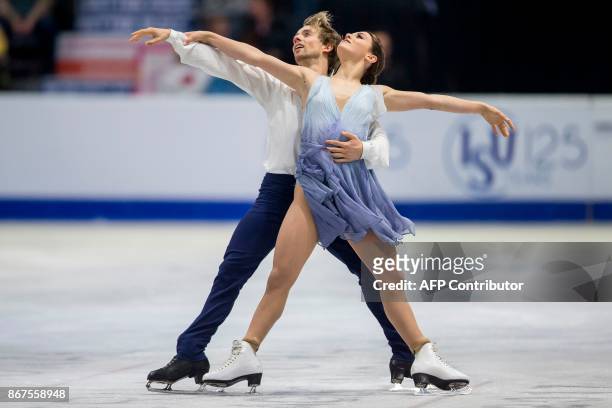 Kaitlin Hawayek and Jean-Luc Baker of the US perform their free dance in the dance competition at the 2017 Skate Canada International ISU Grand Prix...