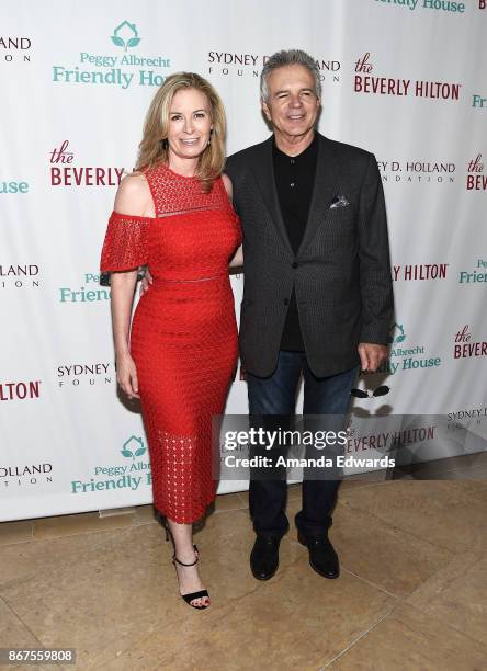 Babette Ison and actor Tony Denison arrive at Peggy Albrecht Friendly House's 28th Annual Awards Luncheon at The Beverly Hilton Hotel on October 28,...