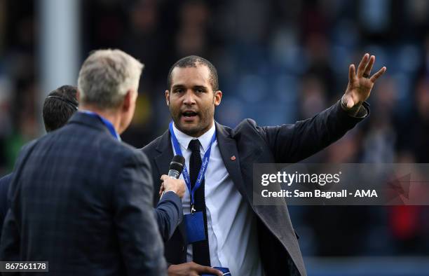 Clarke Carlisle former Queens Park Rangers player during the Sky Bet Championship match between Queens Park Rangers and Wolverhampton at Loftus Road...