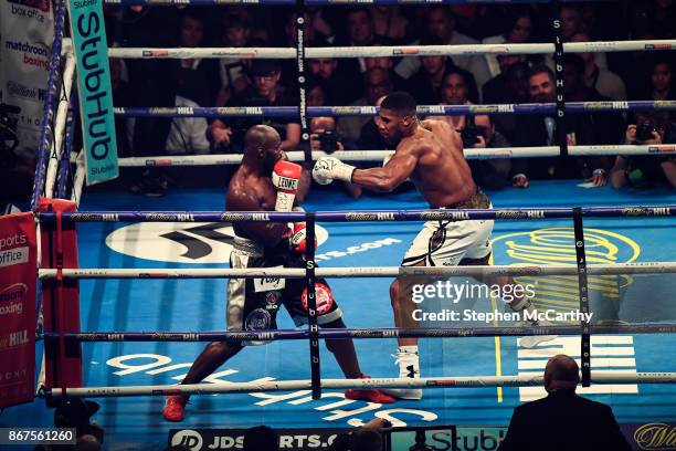 Cardiff , United Kingdom - 28 October 2017; Anthony Joshua, right, and Carlos Takam during their World Heavyweight Title fight at the Principality...