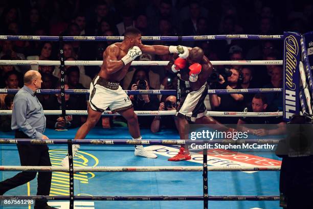 Cardiff , United Kingdom - 28 October 2017; Anthony Joshua, left, and Carlos Takam during their World Heavyweight Title fight at the Principality...